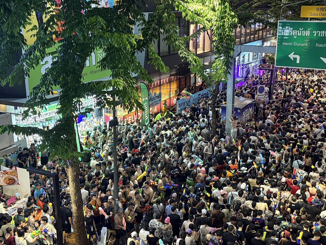 Songkran night crowds on Silom Road, Bangkok