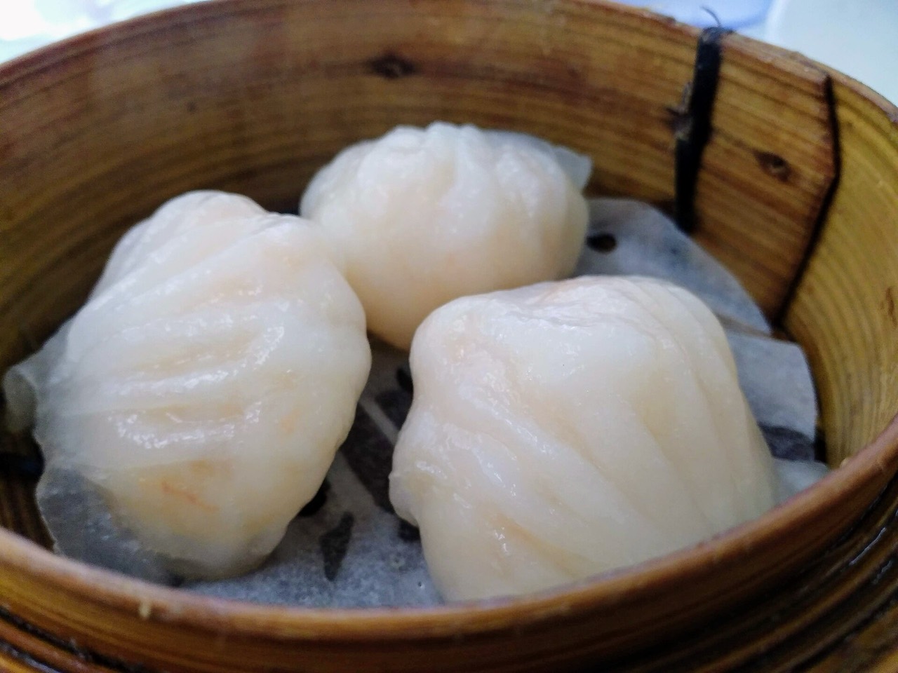 Dim sum in a bamboo steamer