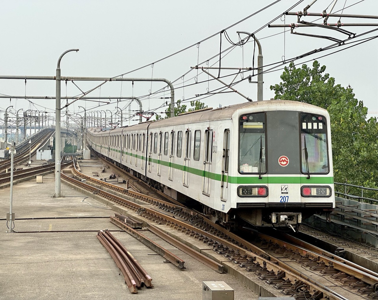 A Shanghai Metro Line 2 train arriving at a platform