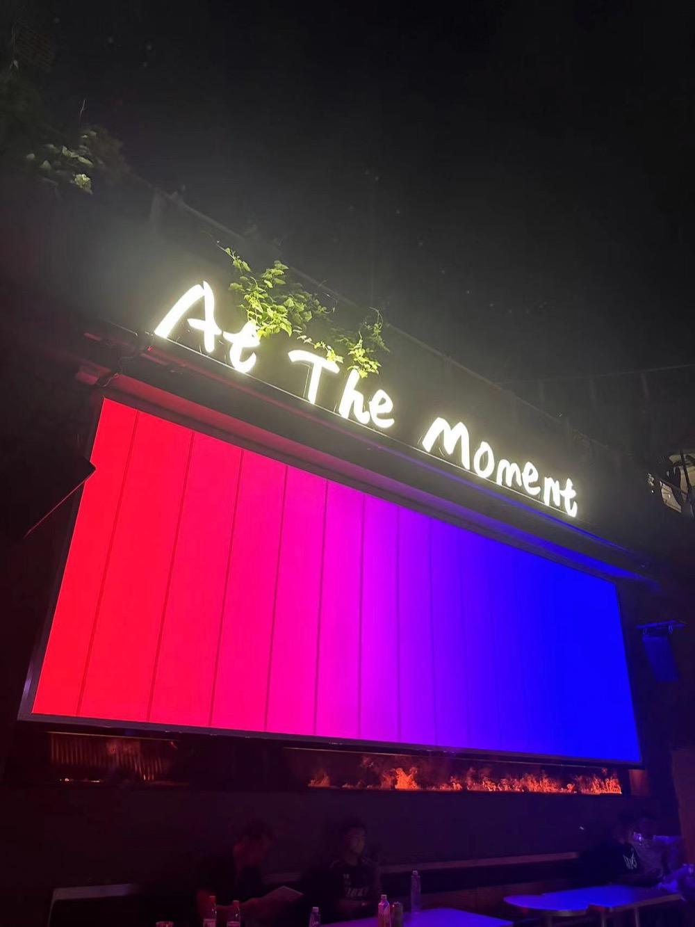 At The Moment (ATM) club, Chegongmiao Shenzhen — the glowing sign over the LED wall